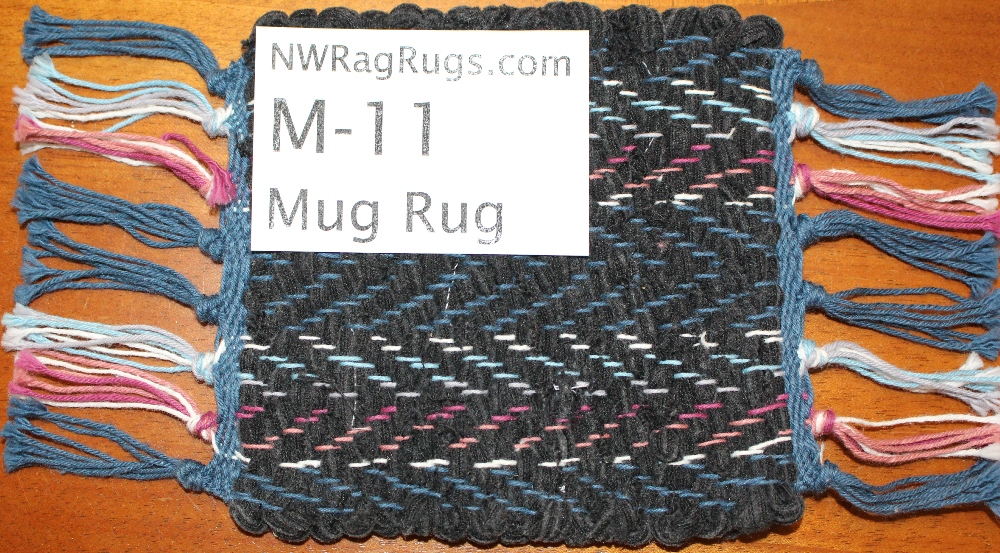 Misc #M-11 Mug Rug. Main colors: Black w/stripes